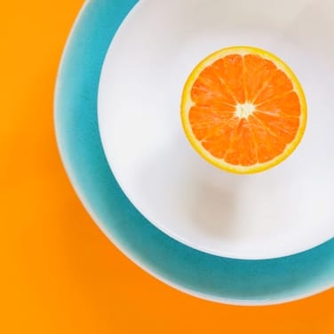 half-orange on a plate